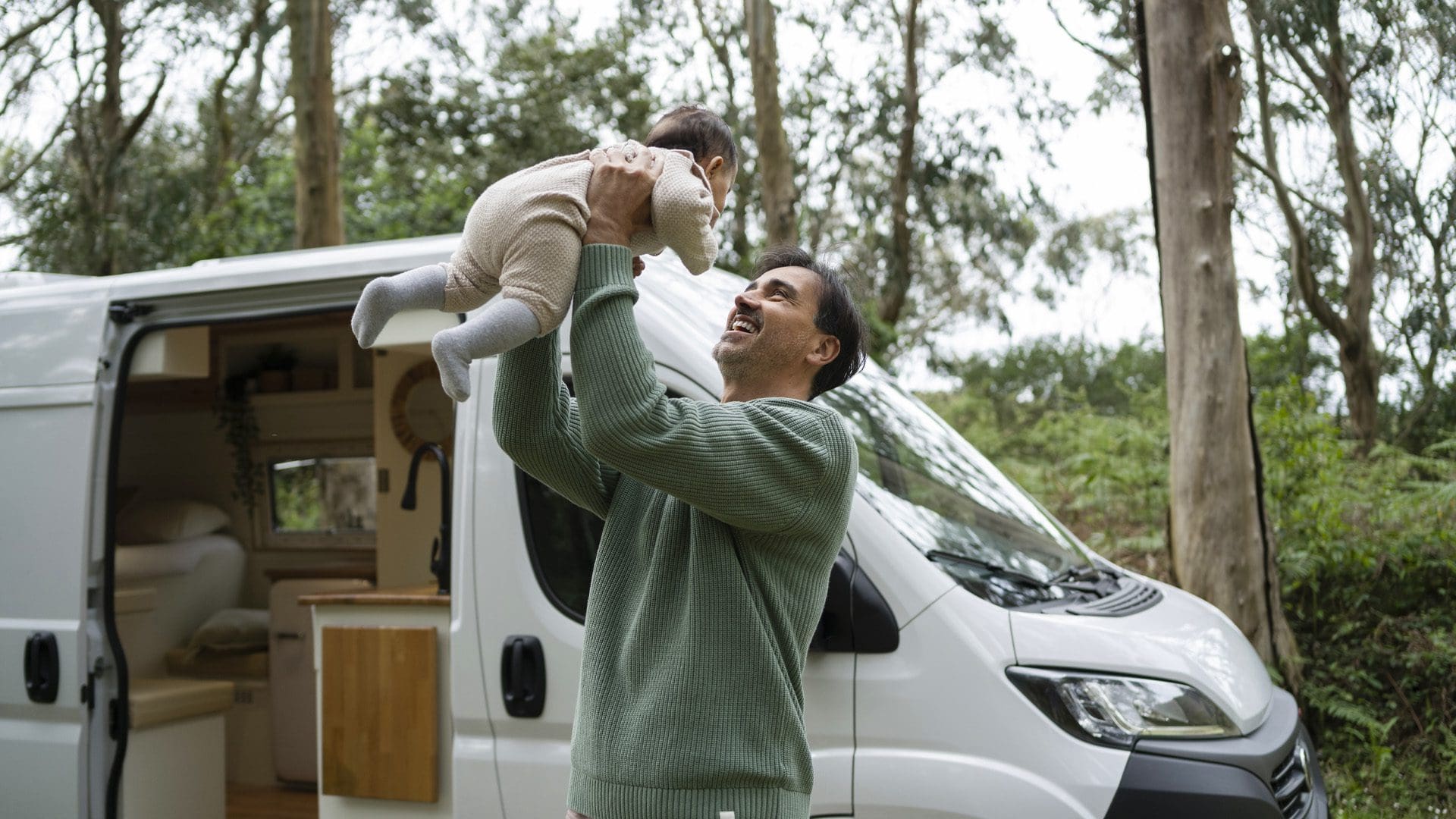Man carrying a baby